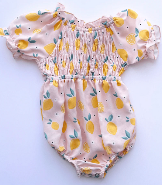 Jolie Puff Sleeve Smock Romper in Pink Lemonade